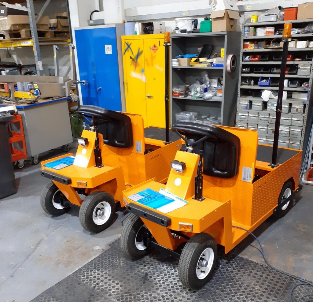2 Orange e250 Electric Tugs