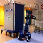 M 12 Electric Pedestrian Tug Being Used To Transport Metal Container thumbnail