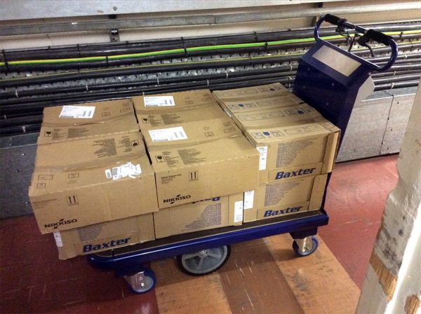M 15 Electric Platform Truck With Stacks Of Boxes