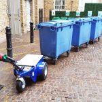 Jobmaster HD Electric Pedestrian Tug towing blue bins thumbnail