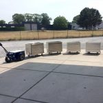 Jobmaster HD Electric Pedestrian Tug towing metal containers thumbnail