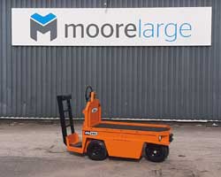 Customer Testimonials 10 Electric Truck Under Moorelarge sign