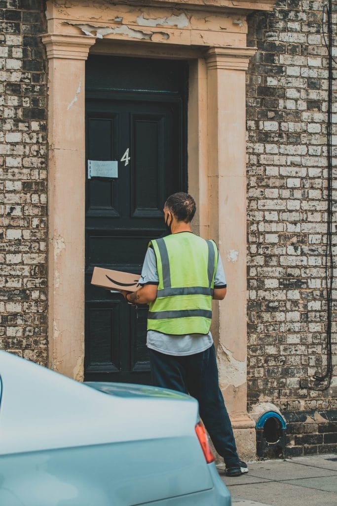 man delivery parcel to door