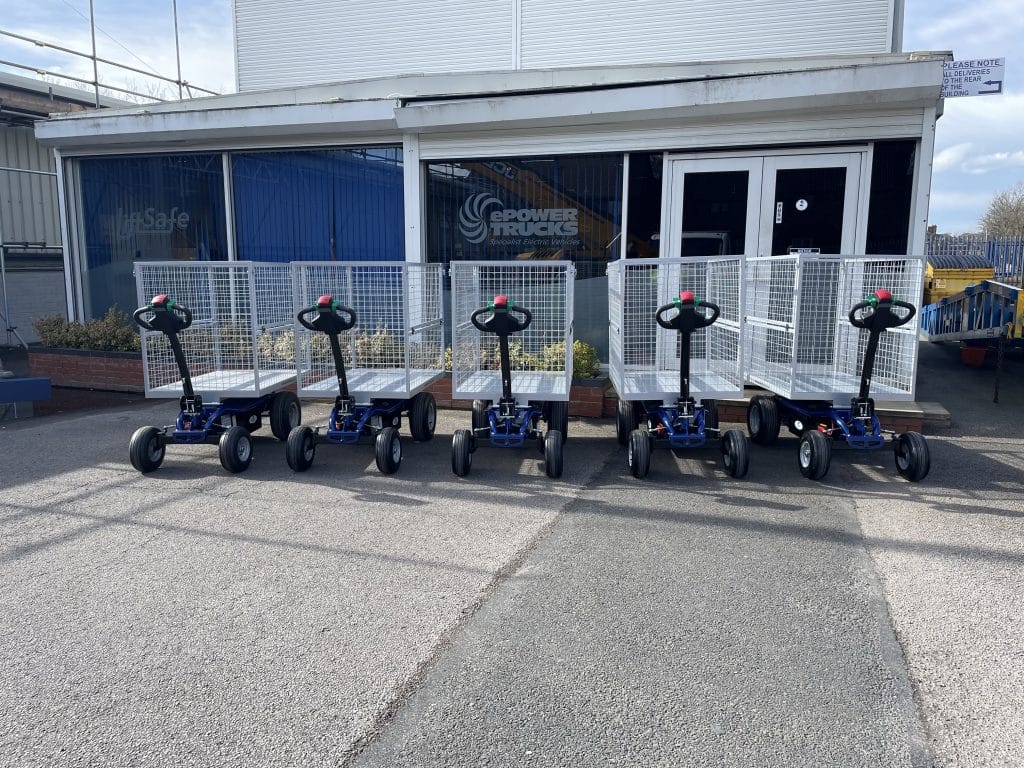 5 electric pedestrian powered caged trolleys