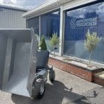 EP Electro Barrow in front of ePowerTrucks window thumbnail