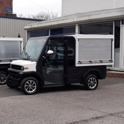 Black & White Electric Last Mile Delivery Vehicle With Metal Shutter